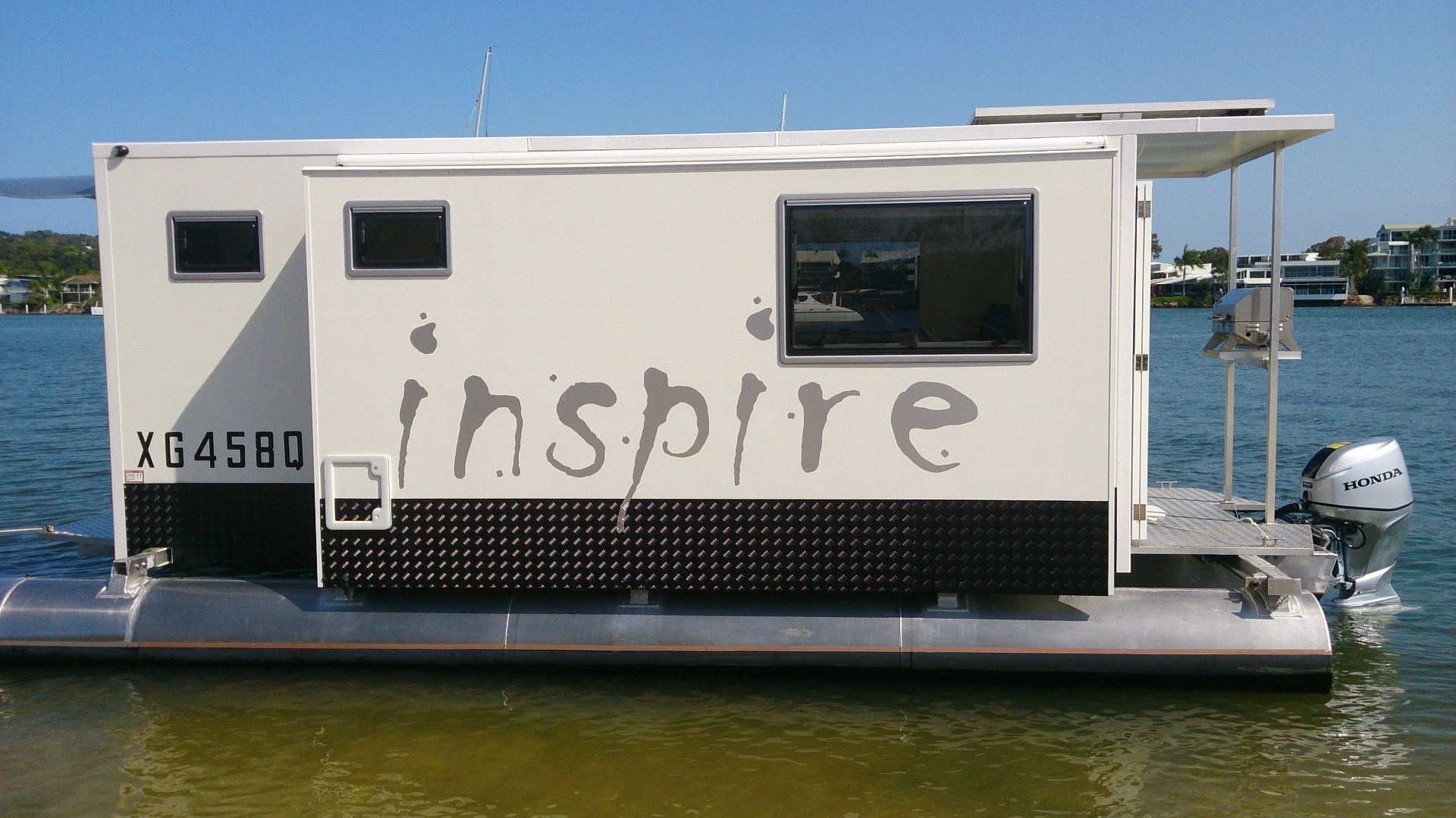 Inspire trailerable houseboat