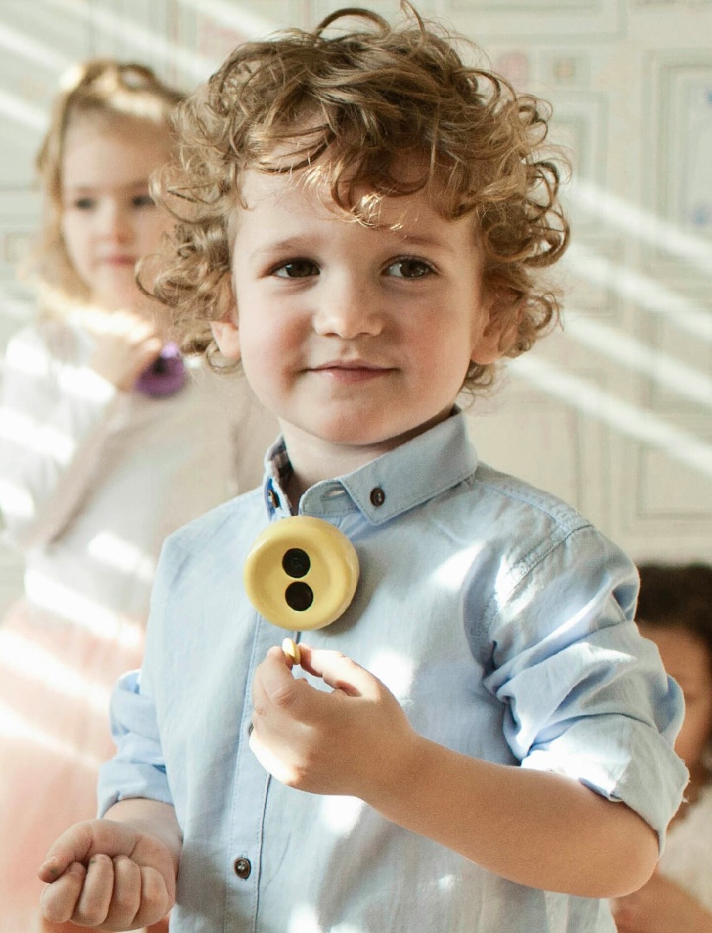 Buttonshaped wearable camera captures family moments