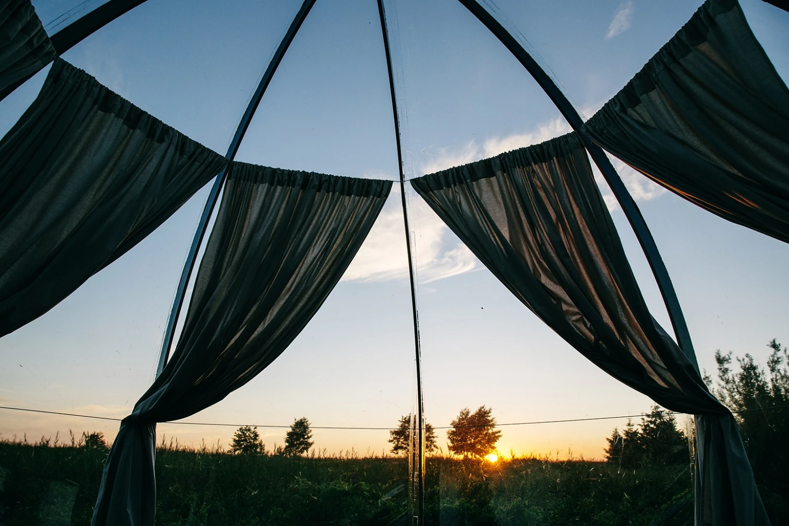 The Oasis dome features a series of fixed curved arches made from segmented veneer and a weather resistant clear skin