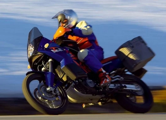 The 990 Adventure S is 35mm taller with 35mm of additional ground clearance - it's a trade off - while the additional clearance is great, people with little legs might prefer the lower seat height of the other model Image - P. Mathis