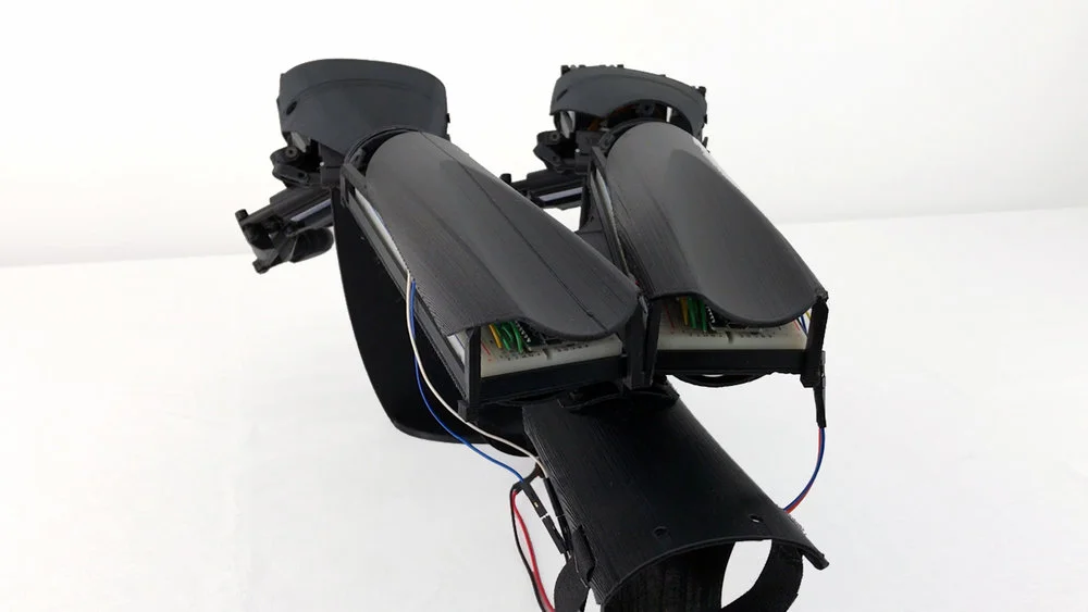 The Double Hand is strapped to an operator's arm