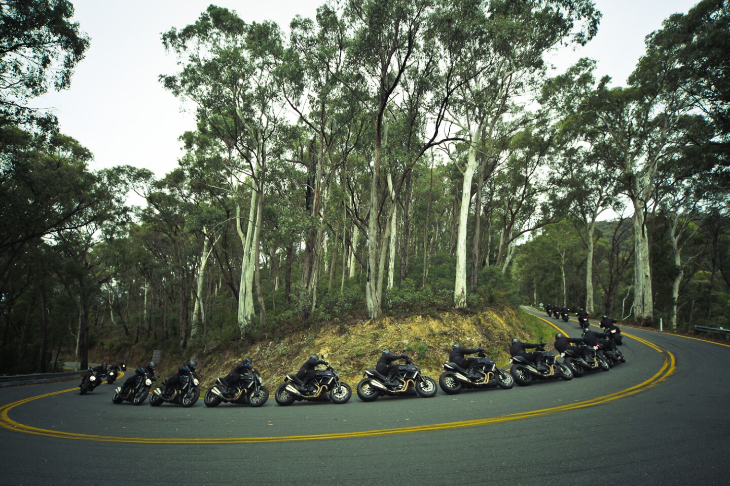 In wide, out narrow: Loz takes the 20120 Ducati Diavel through an Alpine corner.