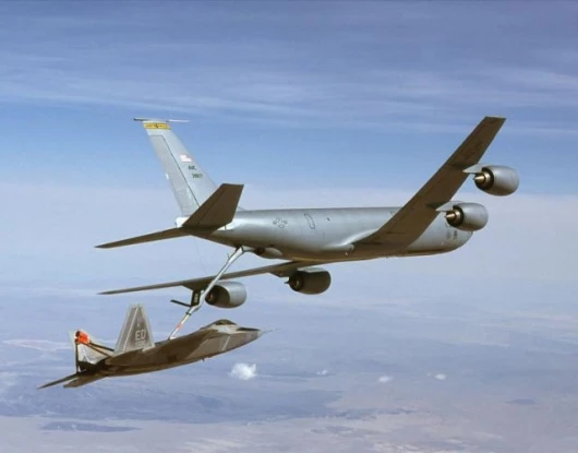 A KC-135 Stratotanker refuels an F-16 Fighting Falcon