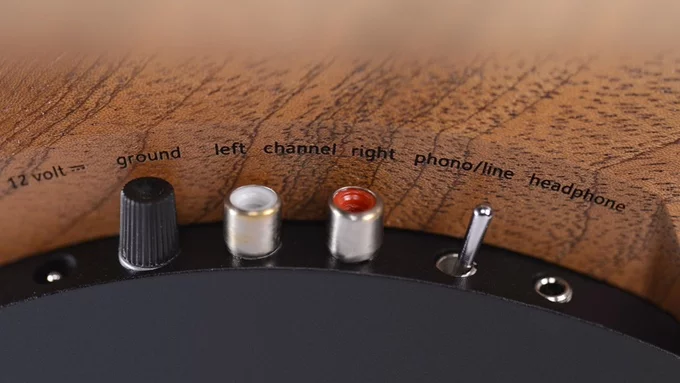 Left/right RCA output ports connect the Wheel to a living room hi-fi system, a ground terminal is included if needed, there's a headphone jack and a switch to choose between phono or preamp line signals