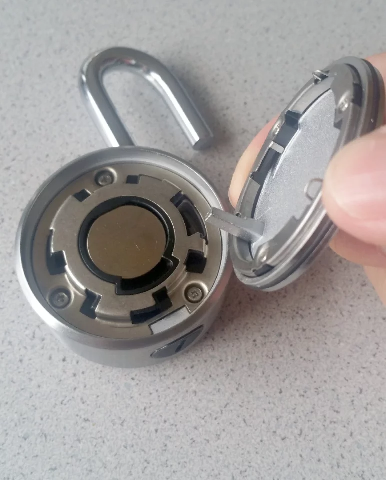 The Noke padlock's back plate removes (without tools) in order to change the battery