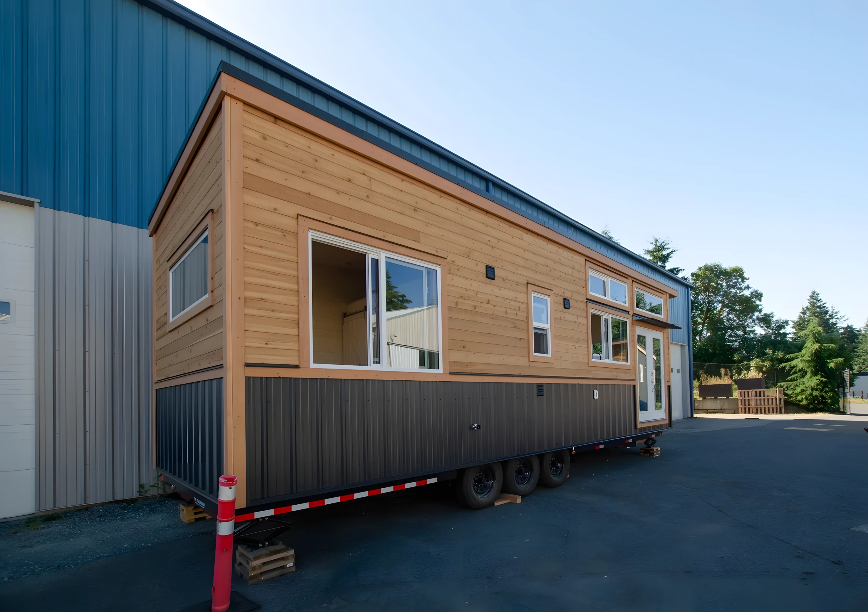 The Dove's exterior is finished in metal siding, with cedar accenting, and is topped by a sloping metal roof