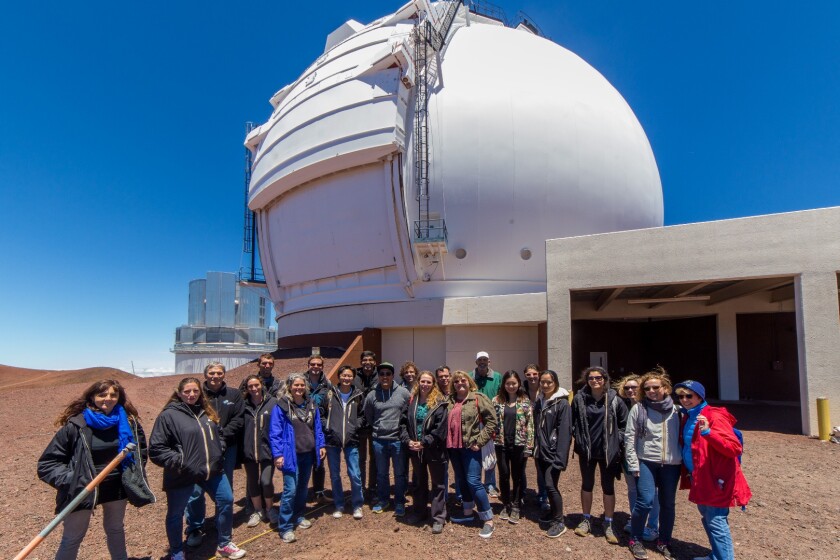 Members of the research team visiting the Keck Observatory in Hawaii