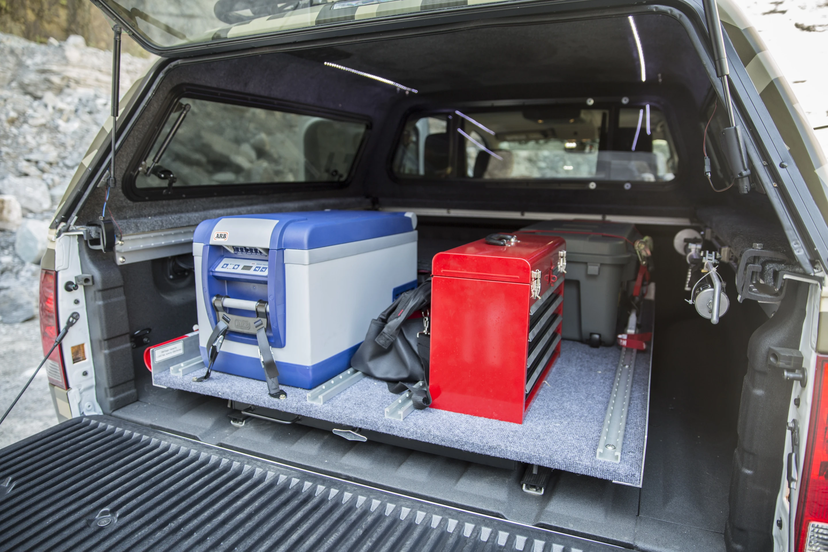 The ARB fridge is tucked in the Project Titan's bed, outside the reach of Alaskan wildlife