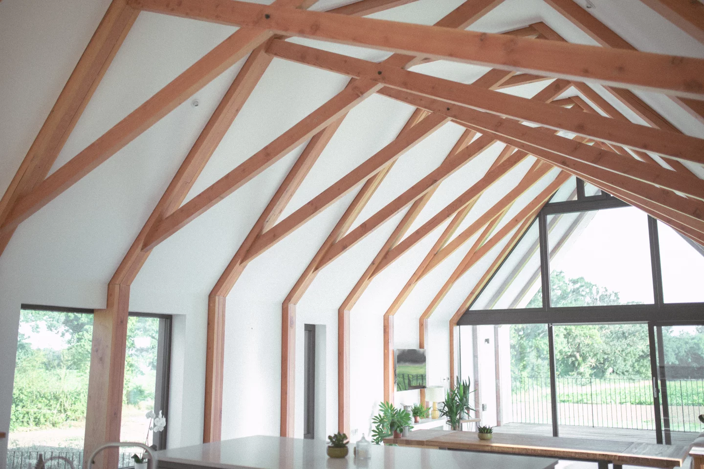 Visitors to Black Barn are greeted by eye-catching timber scissor trusses