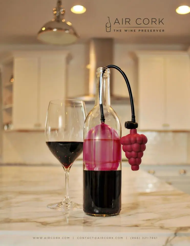 The Air Cork is a device that keeps wine fresh by sealing it with a balloon-like bladder