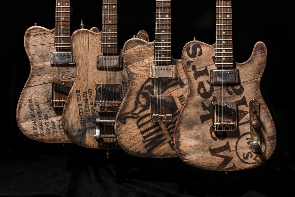 Custom Teleshaped guitars topped in whiskey barrel wood