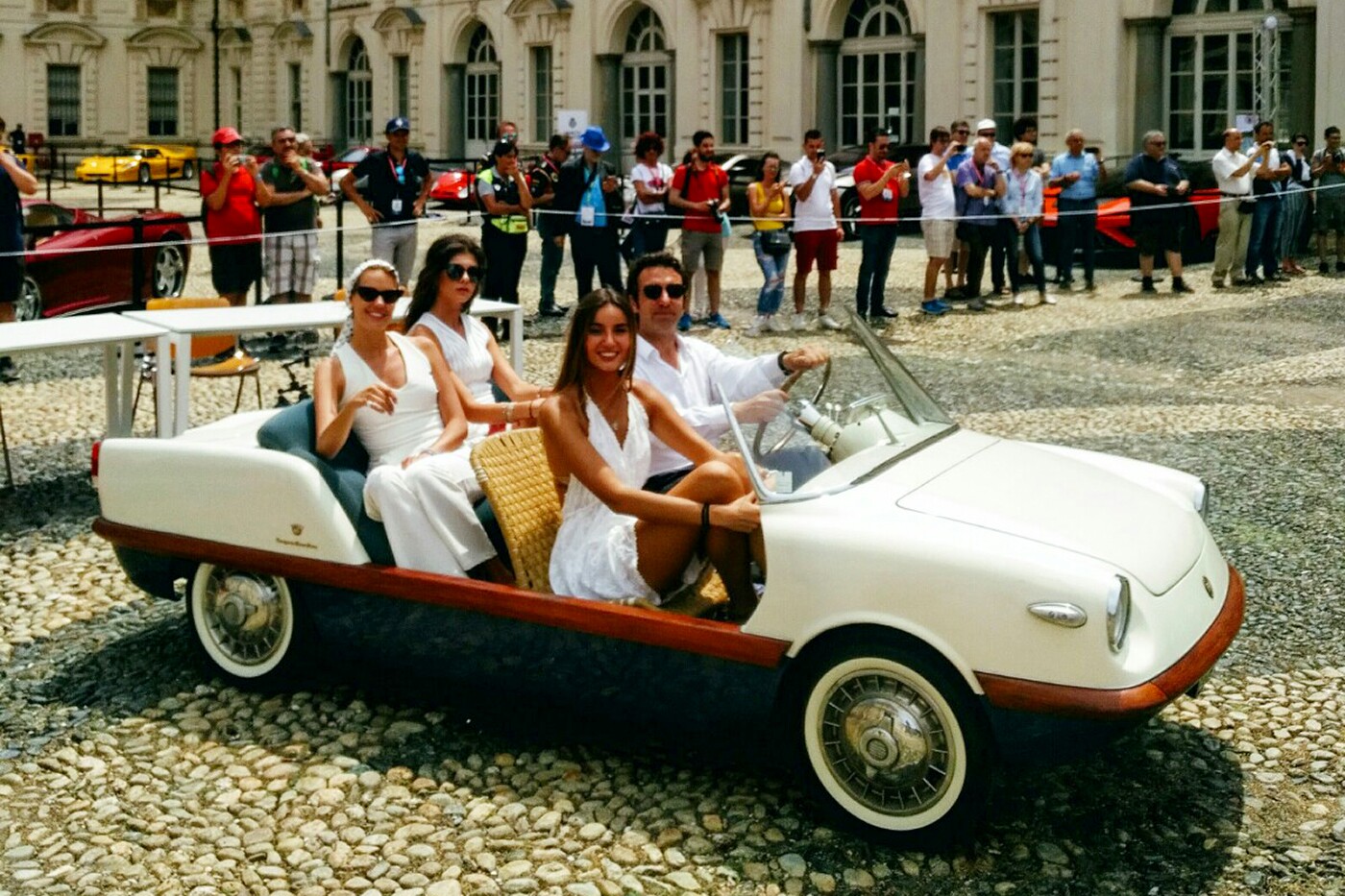 The organiser of the Parco Valentino Concorso, Simone Bertolero, and his 1958 Fiat 500 Boano Spiaggia ... and friends