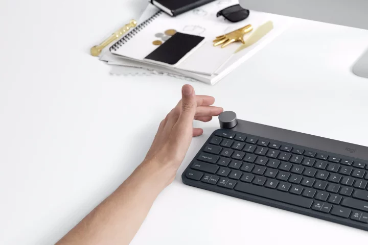 Craft keyboard users can activate and control context-specific functions in software running on a PC or Mac using the multifunction dial