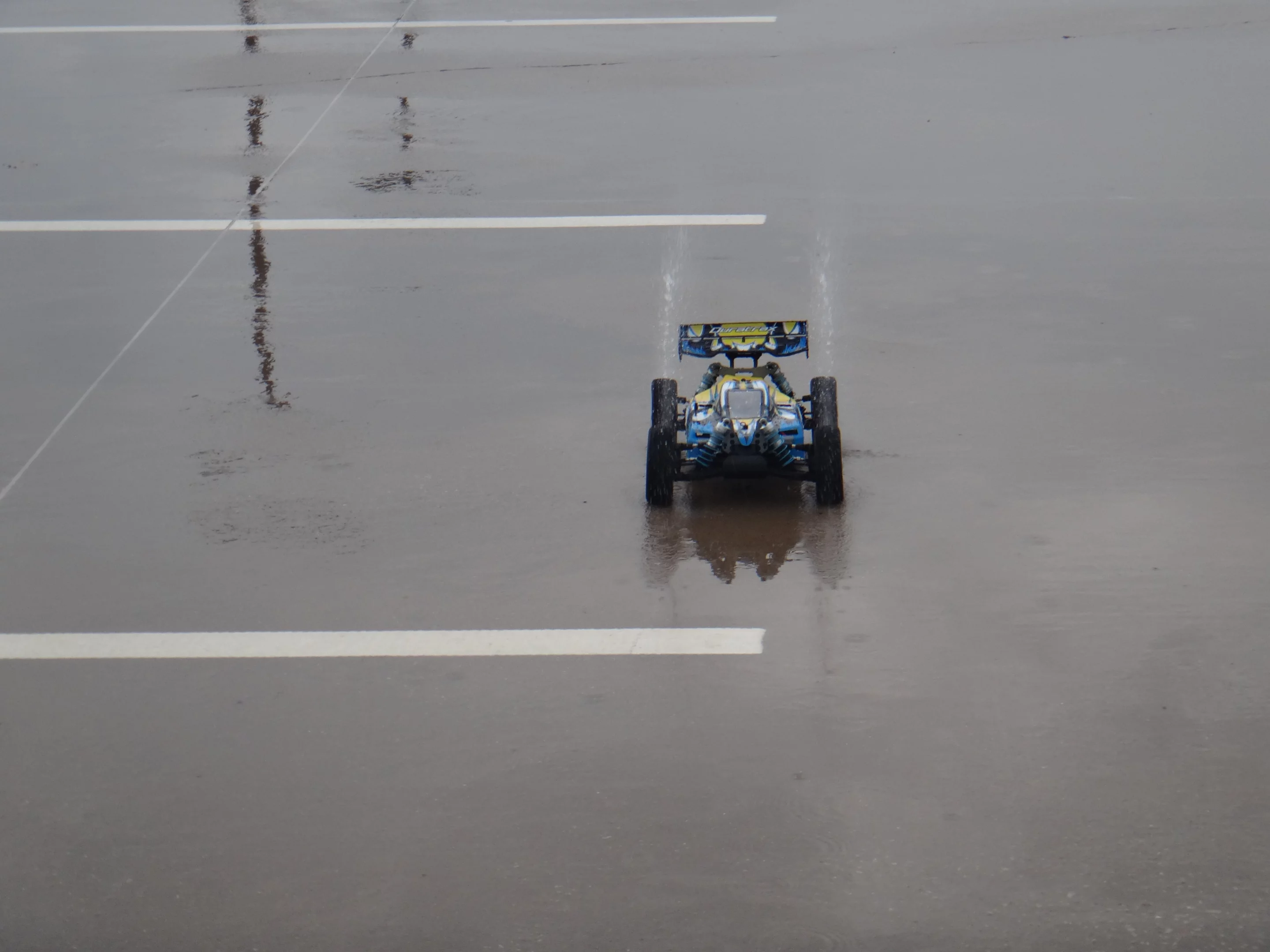At full speed, the front tires will visibly lift off the ground a tad with each little bump in the road