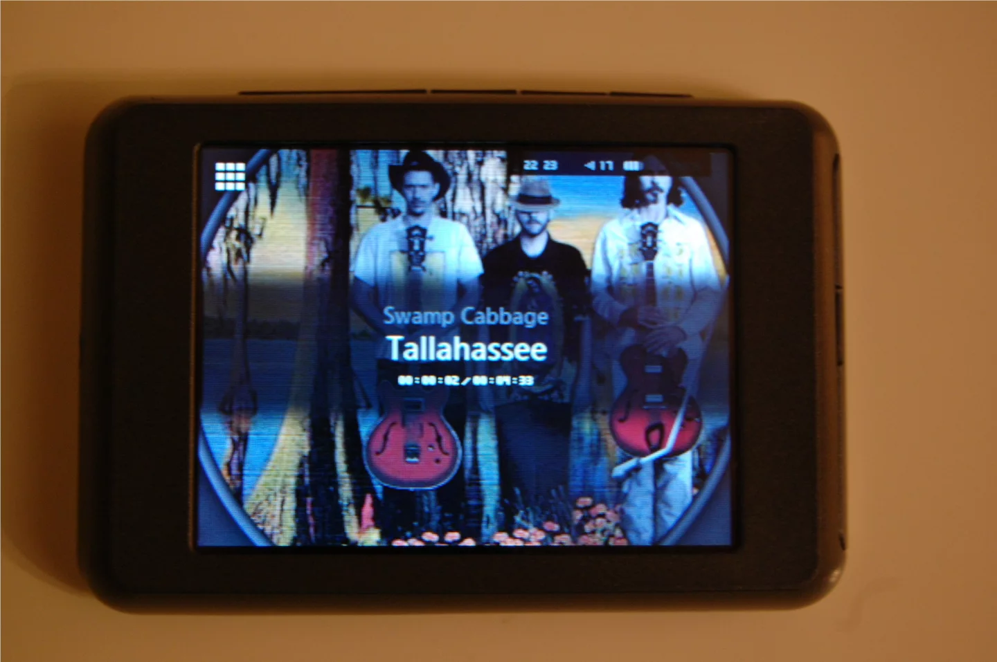 As the faux record spins on the make believe deck, a semi-transparent progress bar moves across the screen as the track is played