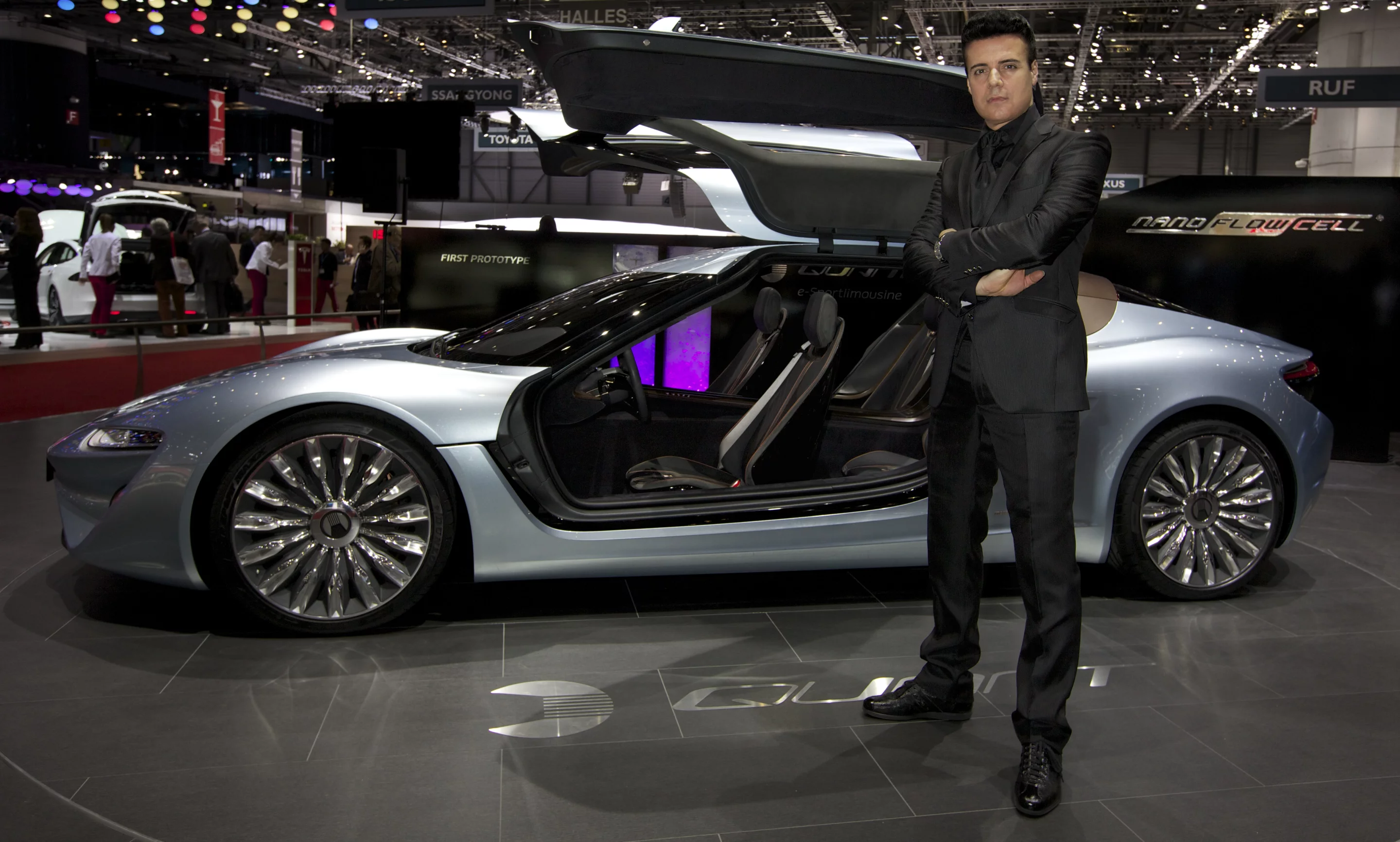 Nunzio La Vecchia poses with the Quant e-Sportlimousine