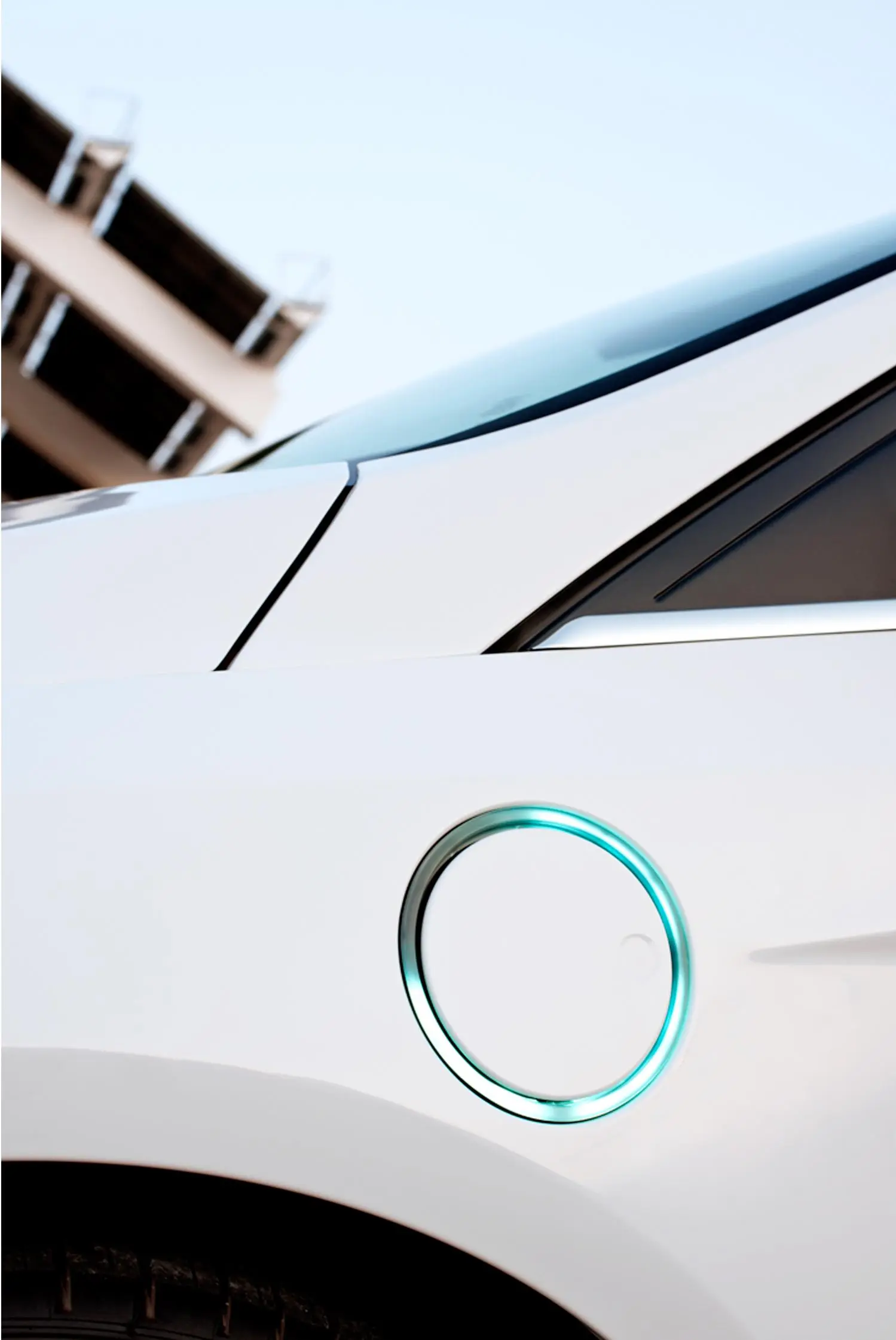 Ford's 2012 Focus Electric features an LED-illuminated charge port - the 23kWh lithium-ion battery pack can be charged in just three to four hours