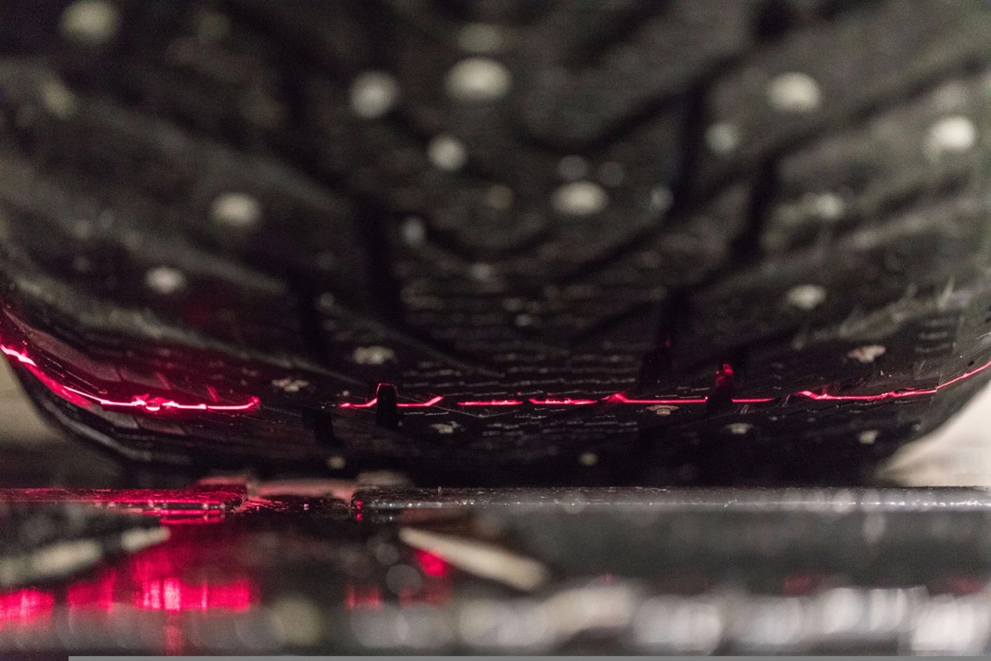 As the vehicle goes over the speed bump-like SnapSkan scanner, lasers automatically shine up into the tire treads, measuring their depth