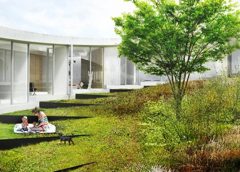 Currently under construction in a rural area near Ålborg, Denmark, the home's looping form starts as a driveway, becomes a private showroom and garage, before opening up into the house proper