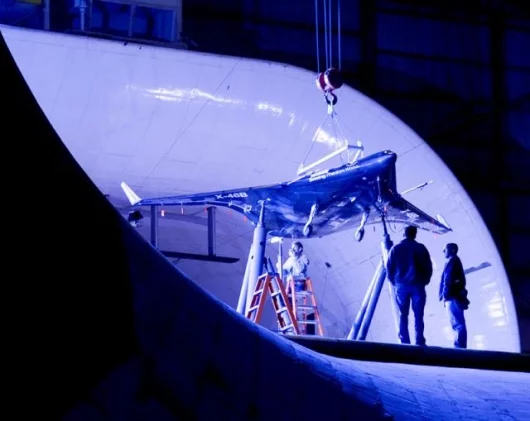 Boeing's Blended-Wing Body (BWB) X-48B prototype in wind-tunnel testing. Photo courtesy of Boeing.