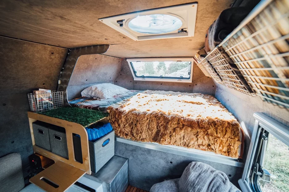The Kimbo camper sleeps two on its loft bed; we wonder if the upcoming full-size pickup version will include a convertible seating area to sleep an additional camper or two