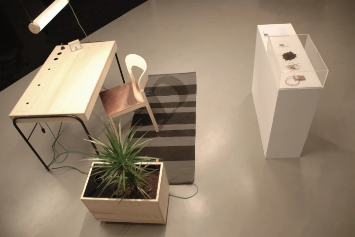 Unplugged is a prototype of an office work station that powers devices via energy that is collected off the human body