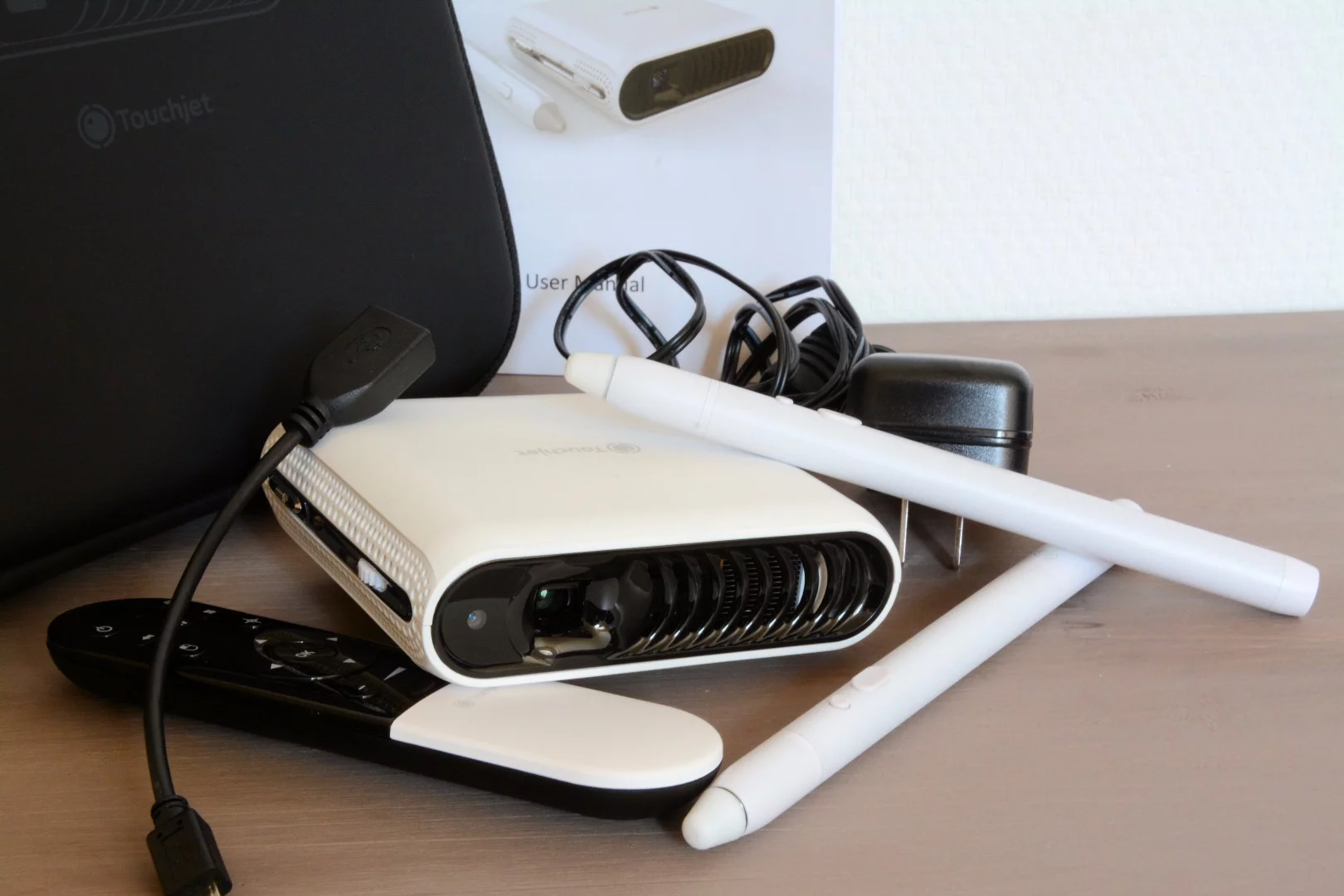 In the box: a Touchjet Pond, an Airmouse, two styli, a 5 V/3 A DC adapter, a carry case, a User Manual and a USB OTG cable