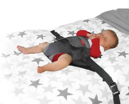 Wriggle Wrapper keeps baby secure whilst sleeping...