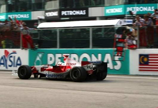 Trulli takes the flag and Toyota's first podium