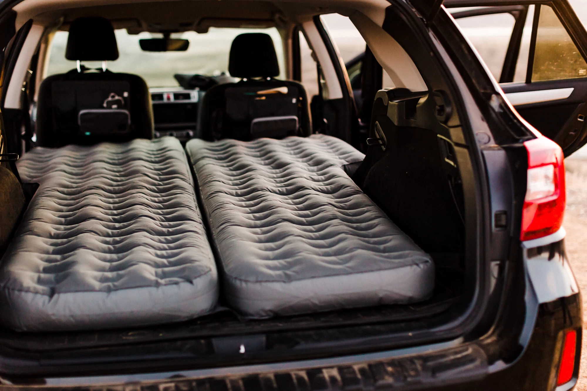 A closer look at the Luno Life Air Mattress 2.0 fully inflated and ready for sleeping bags and blankets