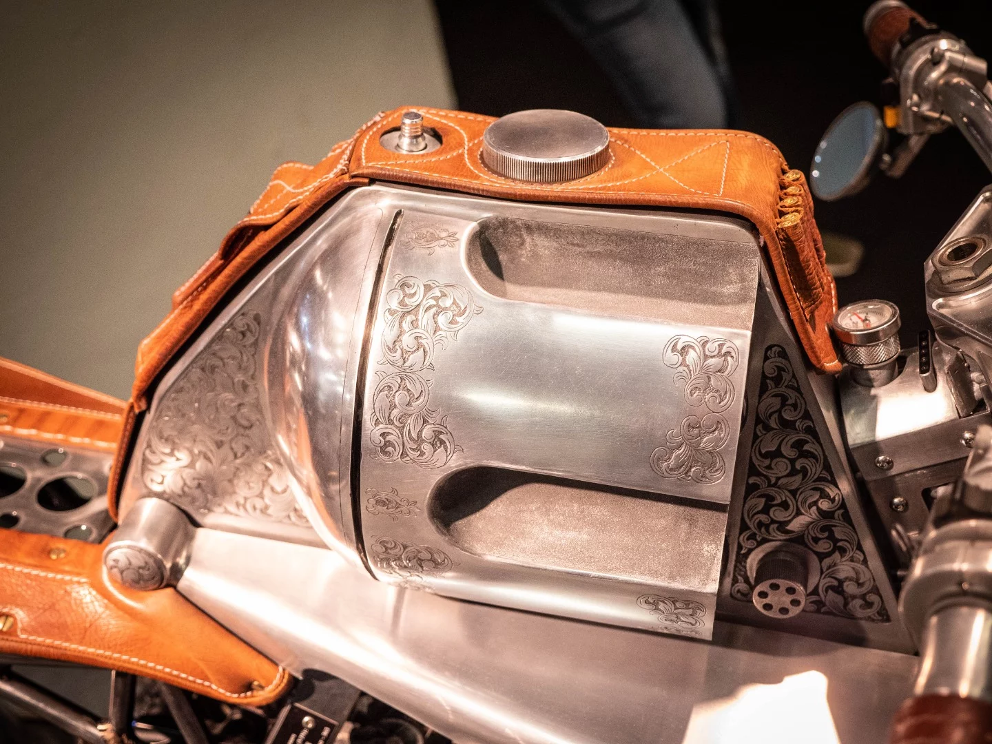 Revolver's beautifully engraved six-shooter tank.