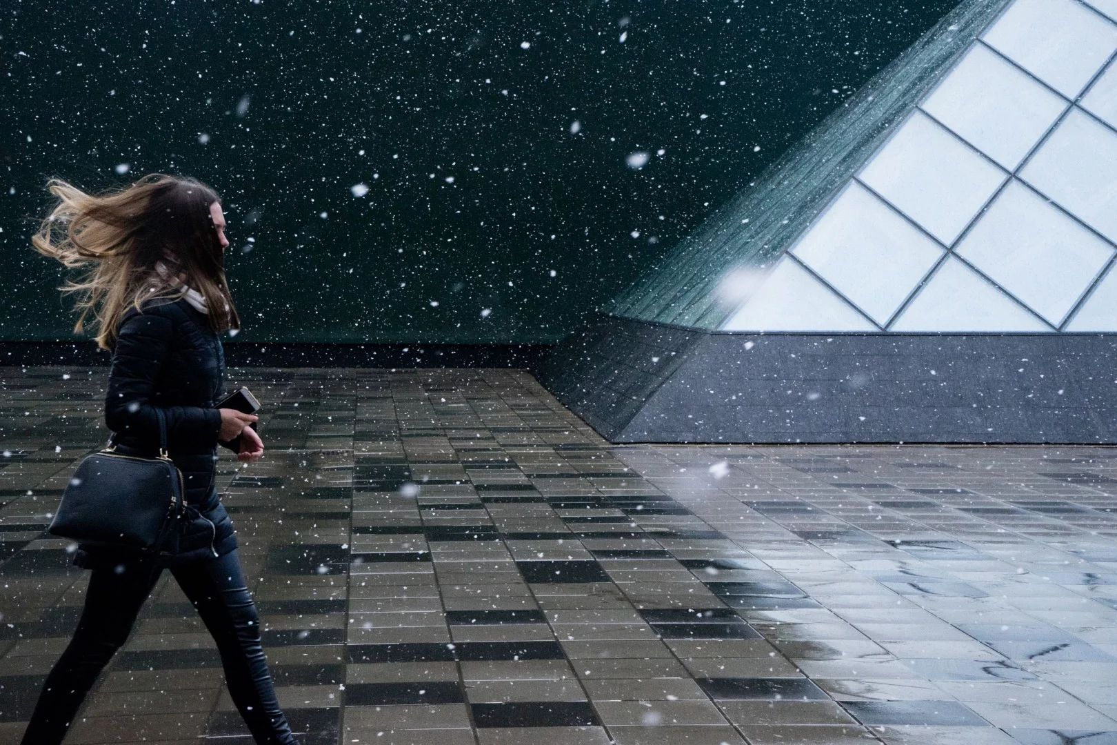 Winner of the Travel category. Spring Snow is a capture of a woman walking in a magical light snowfall, backgrounded by beautiful geometries