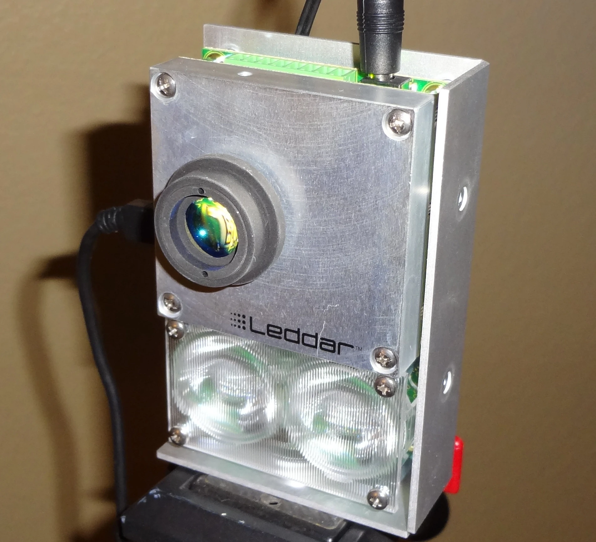The Leddar sensor is a compact package with the LED diffusers below and the distance sensor above