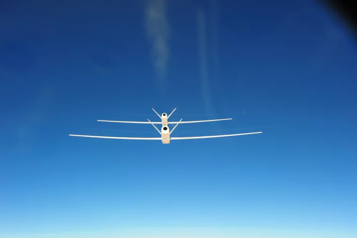 The two NASA Global Hawk UAVs flying in close formation