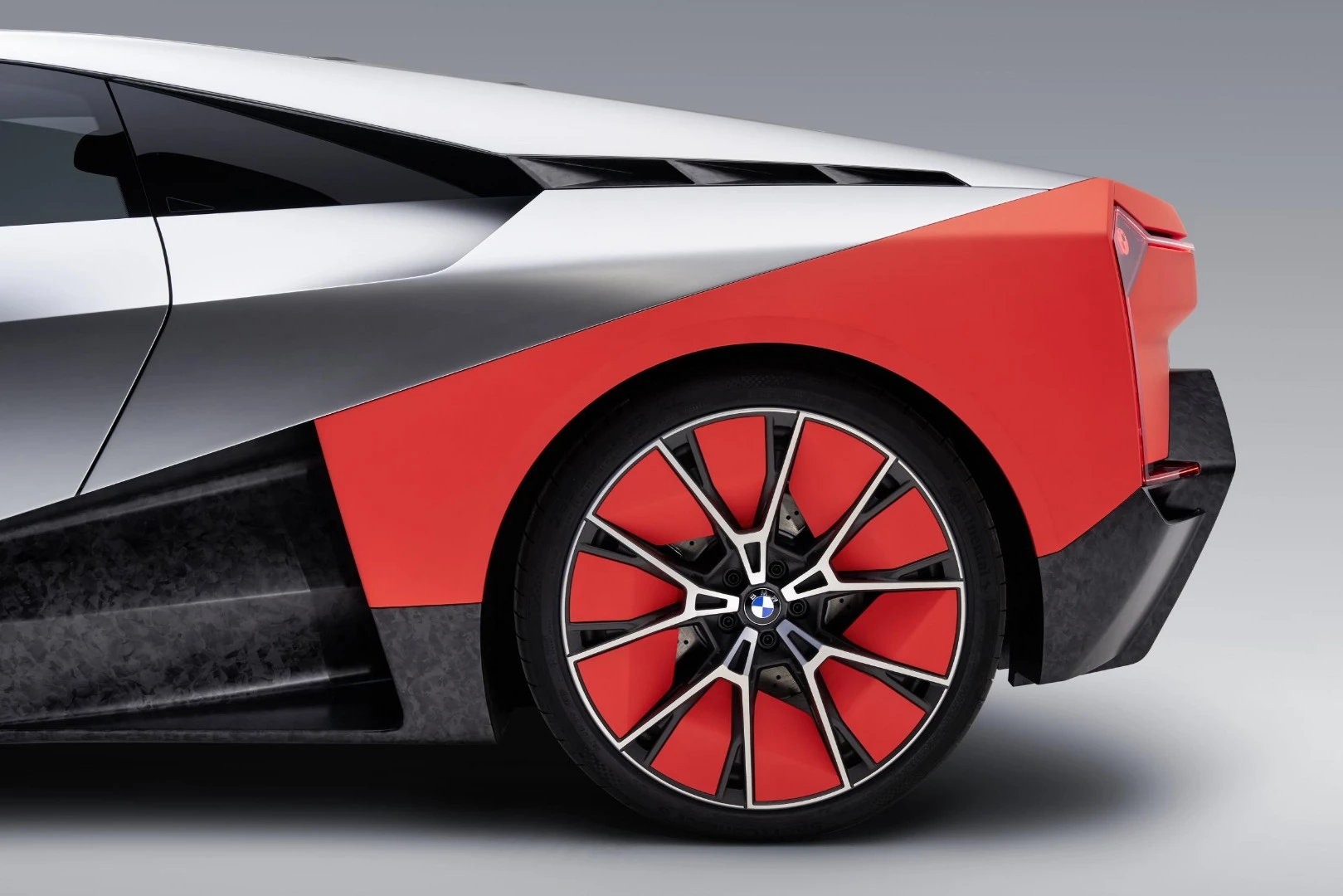 The orange contrasts tie in with the BMW Turbo, one of the cars that influenced the design