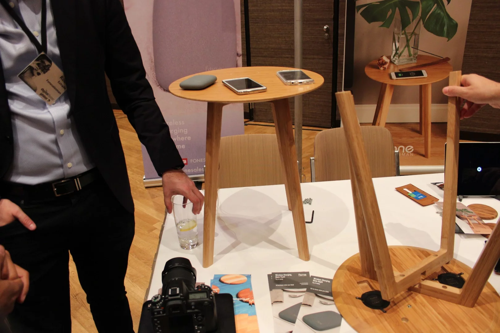 A fully assembled side table to the left, with a part assembled model to the right