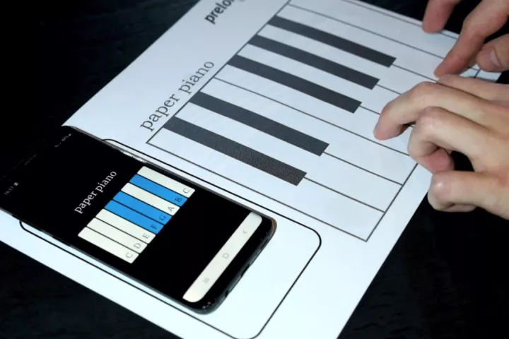 Printed circuits, ordinary paper and NFC technology combine for a piano keyboard that's played on a smartphone