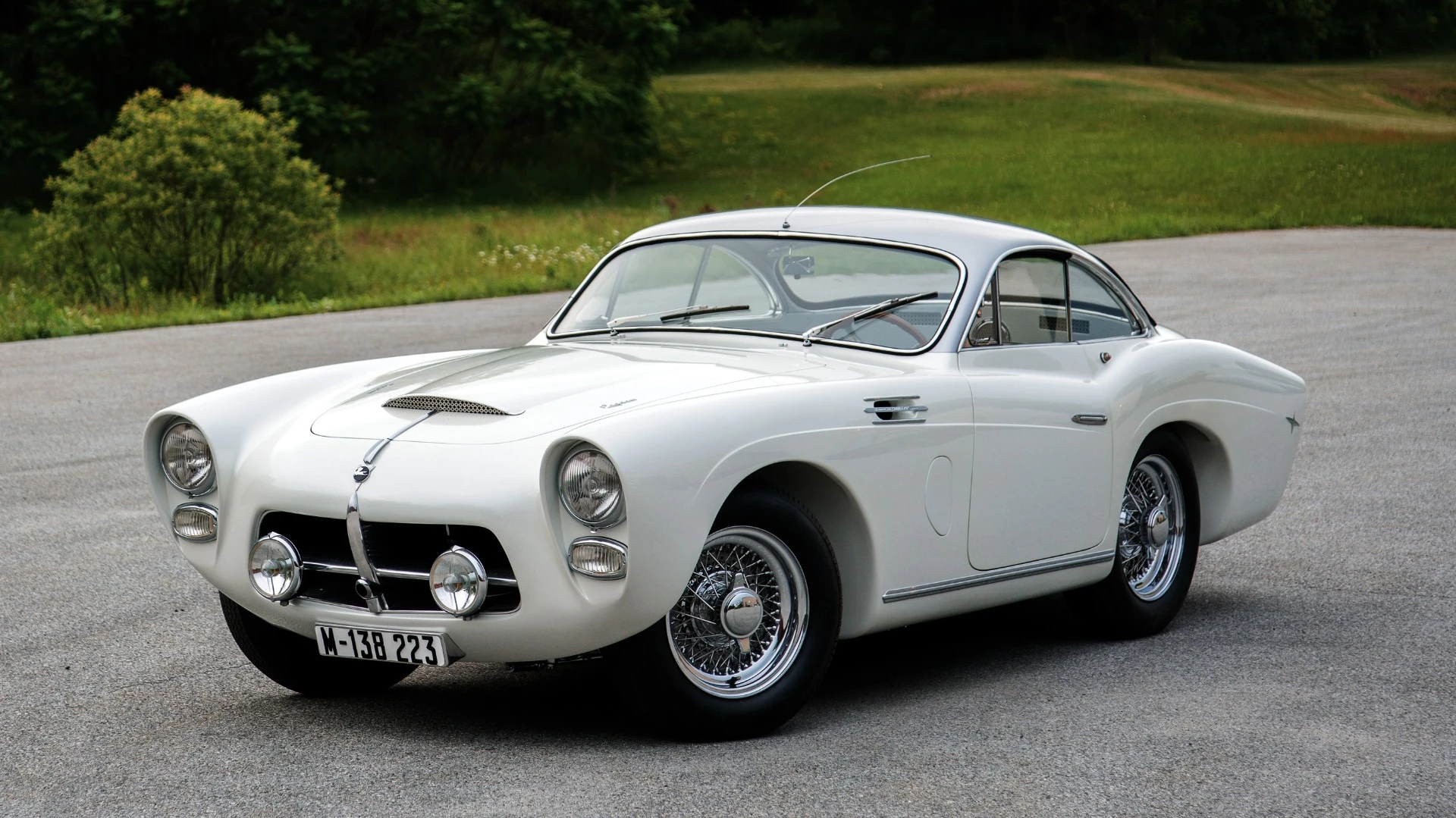 Often referred to as the Spanish Ferrari, the aluminum-bodied Pegaso Z-102 debuted in 1951, with a range of V8 engines. The base 2.5 liter model had a 120 mph (192 km/h) top speed but it was the biggest 3.2 liter, gear-driven desmodromic DOHC alloy V8 that produced a prodigious 360 hp and a top speed of 155 mph with a body that usually resulted in an all-up weight of around 1000 kg. It is believed that 86 Z-102 cars were built between 1951 and 1958, with 19 of the most-powerful 155 mph model produced. The car above is a spectacular survivor, having been sold by RM-Sotheby's for $880,000 at Monterey Car Week 2016. Built for the 1954 Paris Auto Salon show, it used a 195 bhp, 2,816 cc DOHC V-8 engine breathing via two four-barrel Weber carburetors, it was bodied by Saoutchik, yet another variation in production methods of the time which has caused many experts to disqualify it as a genuine production car.