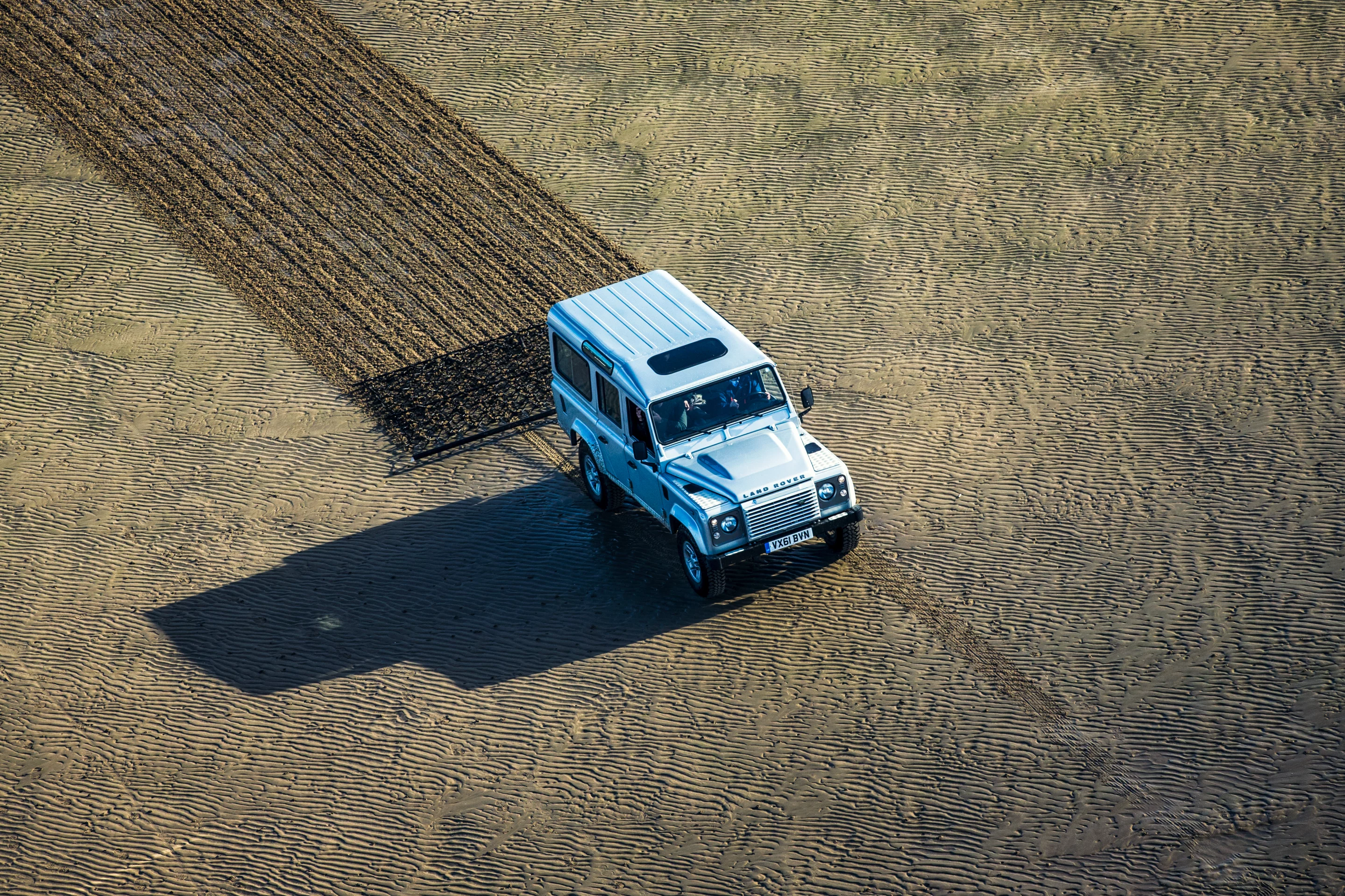 The Land Rovers make their mark with agricultural harrows