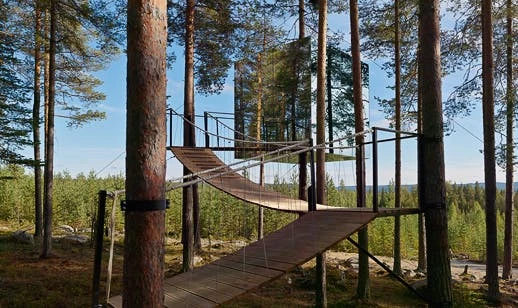 Walkway leads up to the Treehotel's Mirrorcube room in Sweden