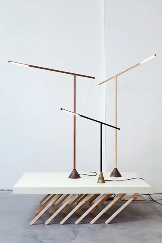 Designed by Mieke Meijer, the Balance Lamp is a wooden LED floor or table lamp that only illuminates when perfectly balanced (Photo: Mieke Meijer)