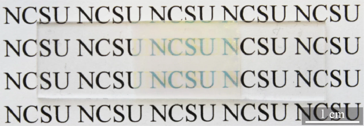 The nano-accordion structure is transparent enough that you can easily read text beneath it