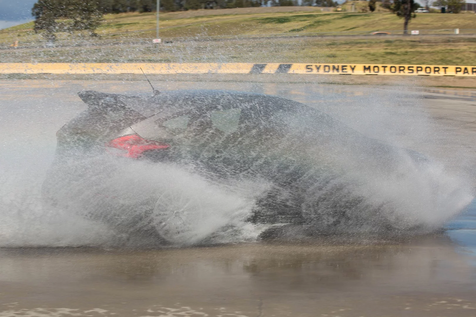 The Focus RS cuts through the splash at the Sydney Motorsports Park