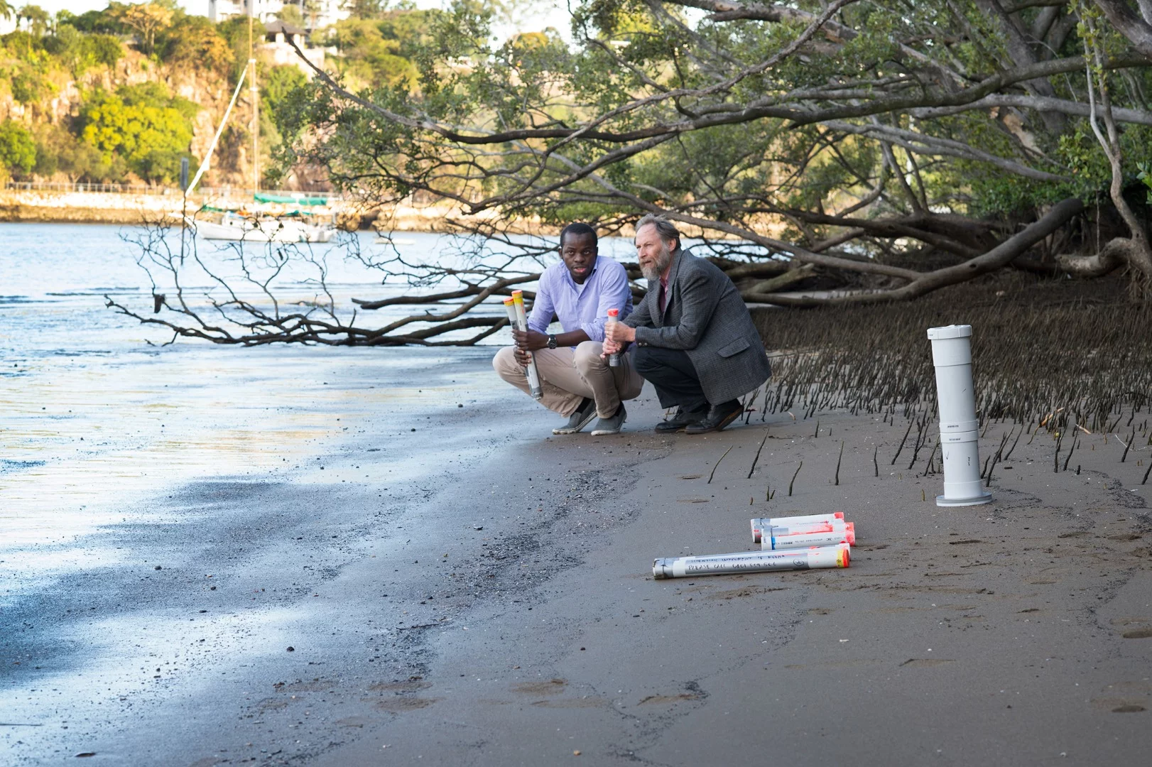 QUT researchers Dr Kabir Suara and Professor Richard Brown with their Drifter device