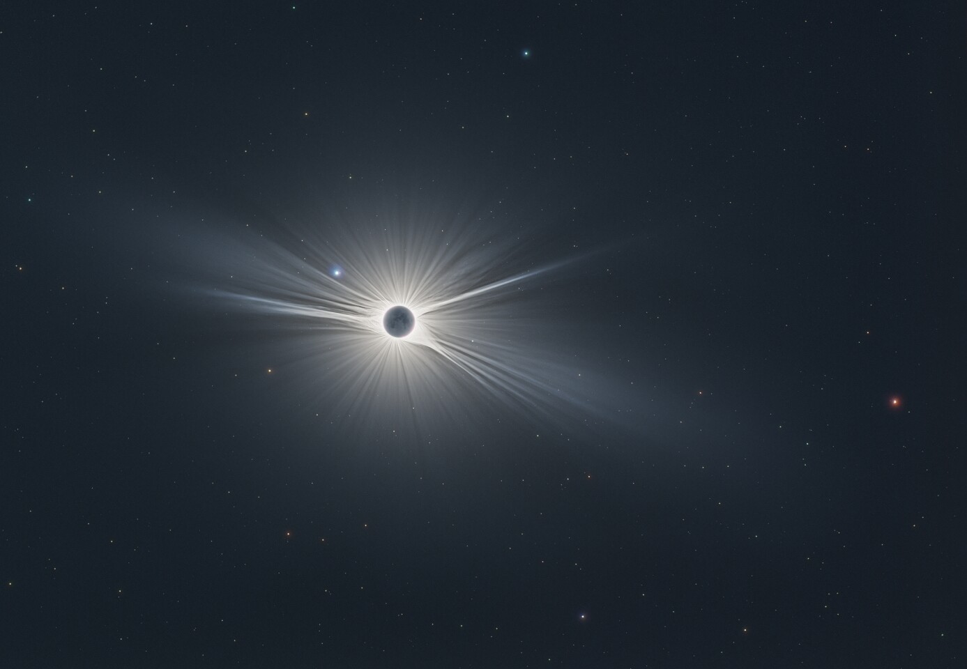 Winner in the Our Sun category. In order to capture this mesmerizing image, the photographer chose the area according to weather forecasts to make sure he would get a clear sky. The image shows the Sun's corona in all its glory during the August total solar eclipse. It is flanked on the left hand side by the blue star Regulus – the little King – and by Mars on the right
