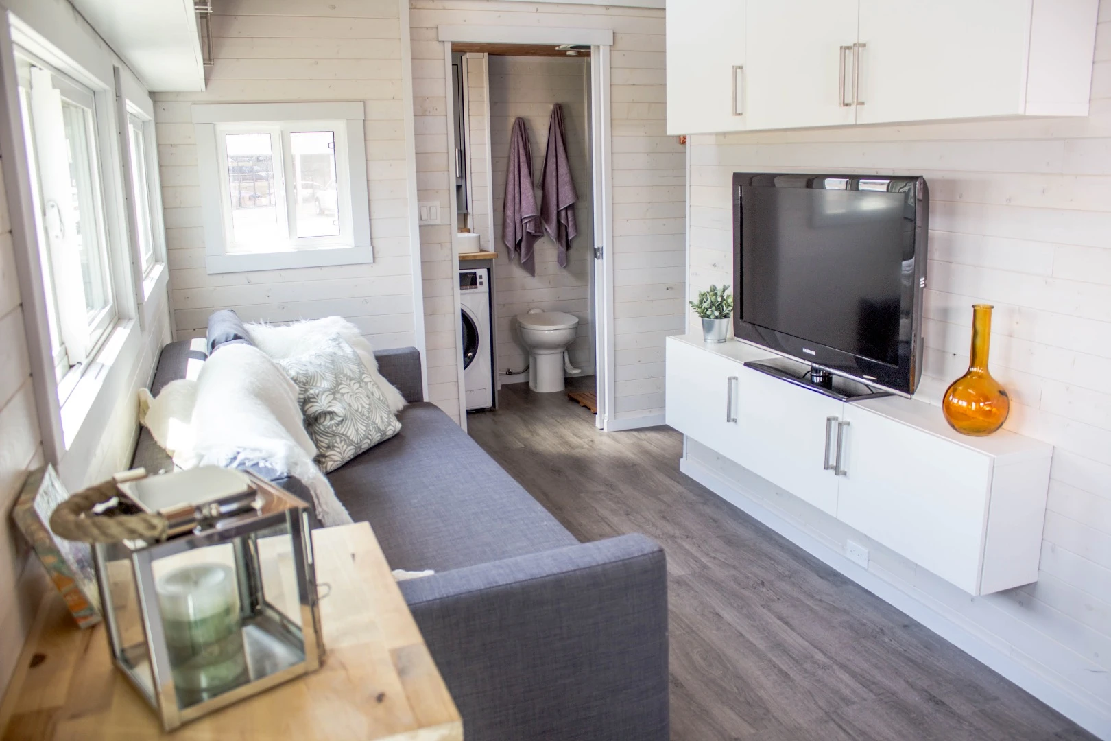 The Aurora's living room looks spacious and light-filled
