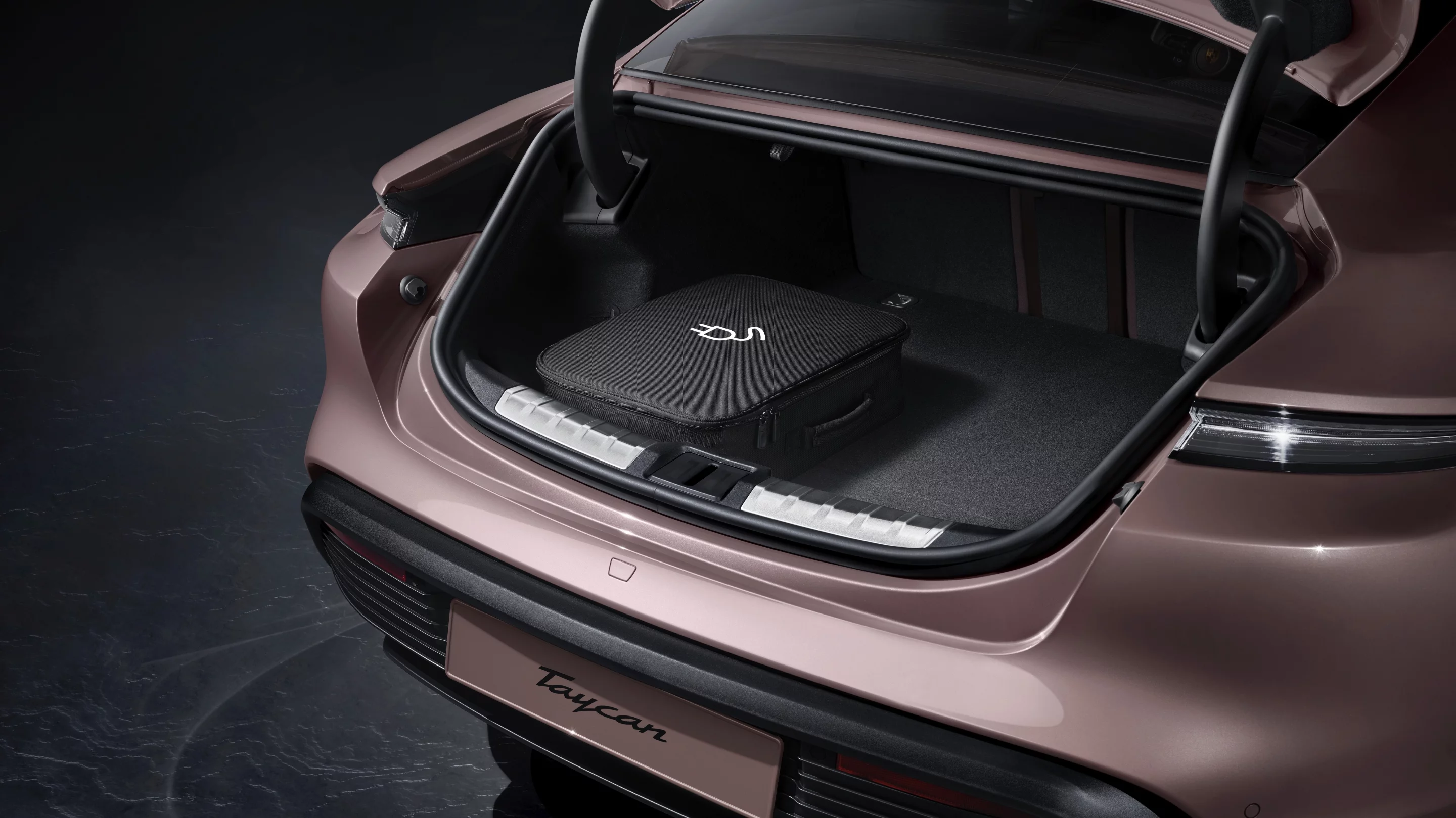 The traditional trunk of the Porsche Taycan is augmented by a front trunk ("frunk") for more storage