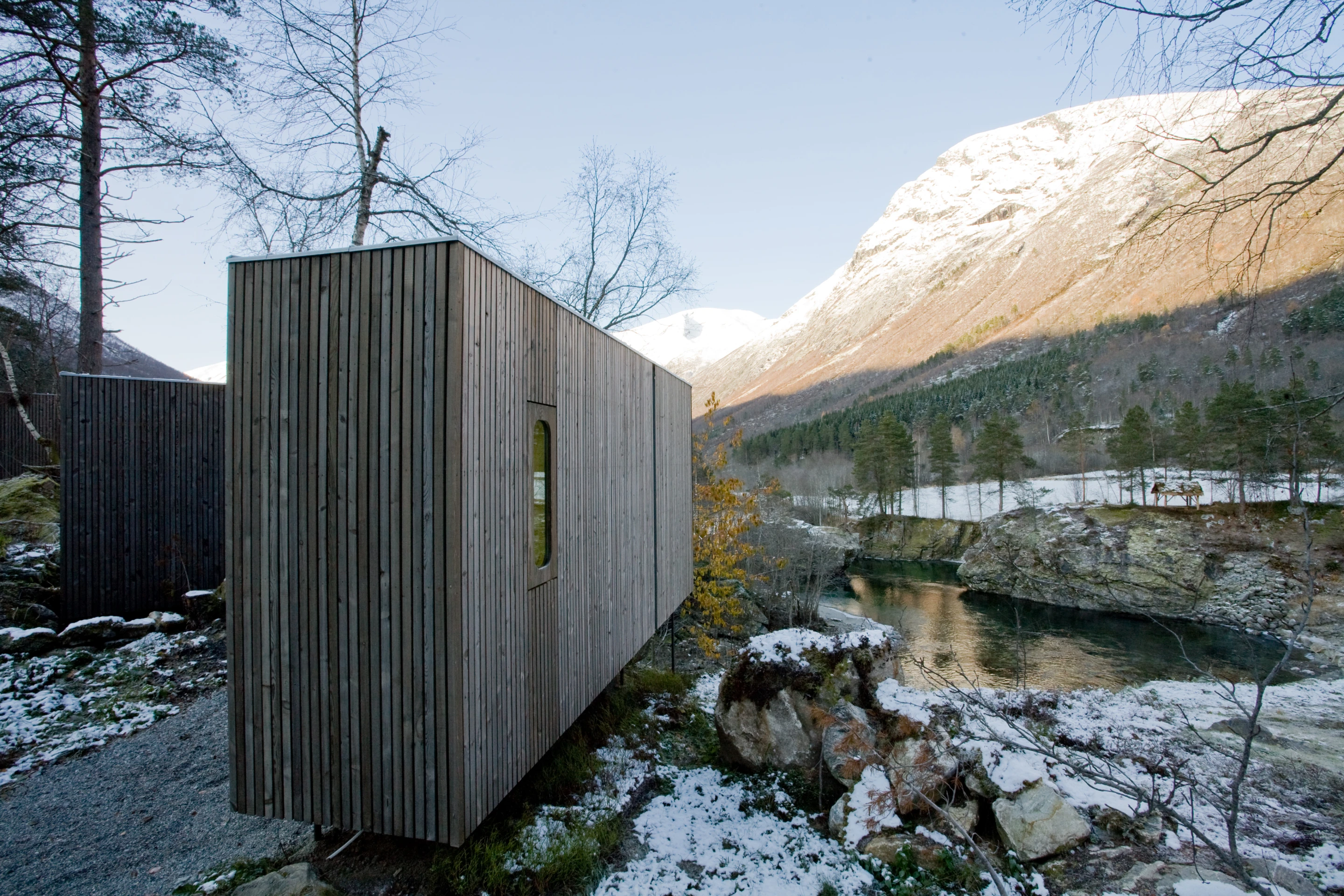 Located outside the small town of Gudbrandsjuvet, Norway, Juvet is positioned amid its main attraction - the pristine forest
