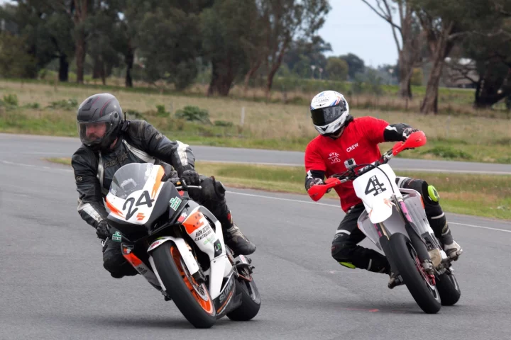 Coach Chas Hern helping Loz with body position, riding lines, braking points and more at the Murray Valley Training Co.