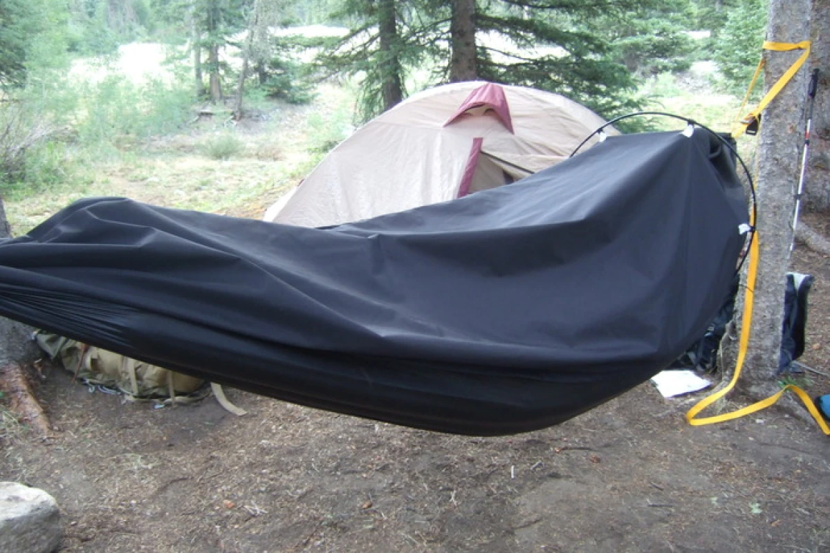 The Alpine Hammock is a lightweight, two-in-one shelter for backpacking and mountaineering